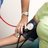 Blood pressure checking upon a female patient