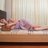 Asian sad woman on the bed in bedroom.