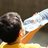 Boy drinking water from bottle.